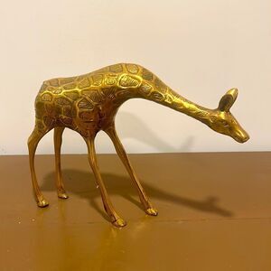 Brass giraffe figure.  Stands 8” high and body length 11”